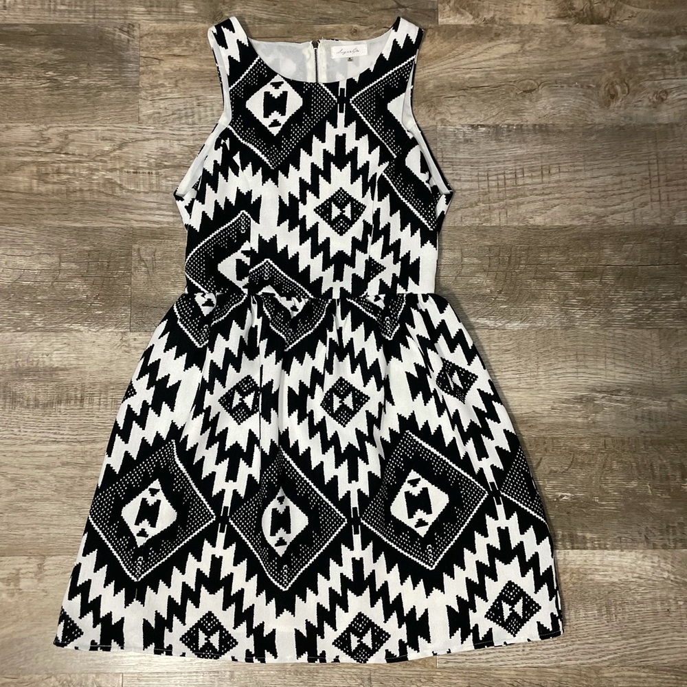 Sugarlips sleeveless black and white dress with back cut out